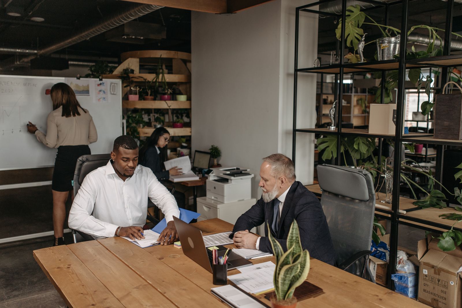 Business leaders working through a growth plan